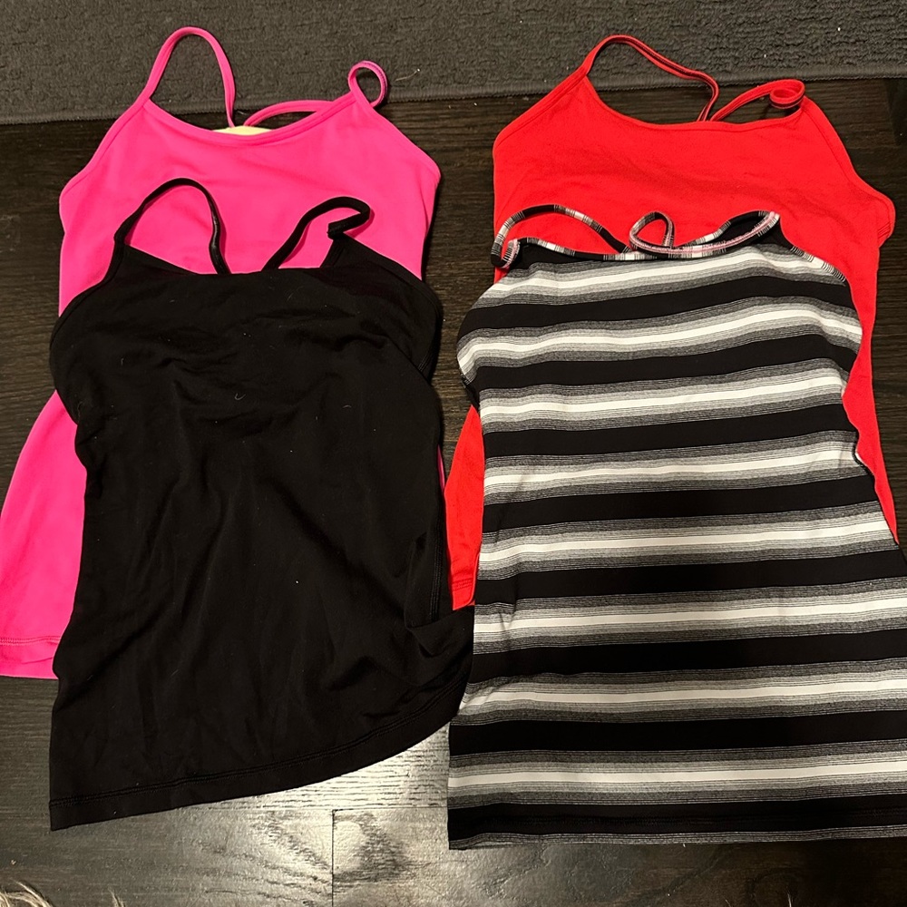 8 Ivivva girls tanks size 12, barely worn